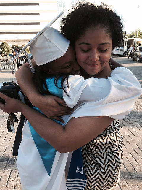 Raising Expectations's staff member with one of the Raising Expectation students at her 2015 graduation from Booker T. Washington High School.